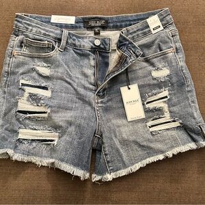 New with tags distressed, jean shorts.  Price is firm.